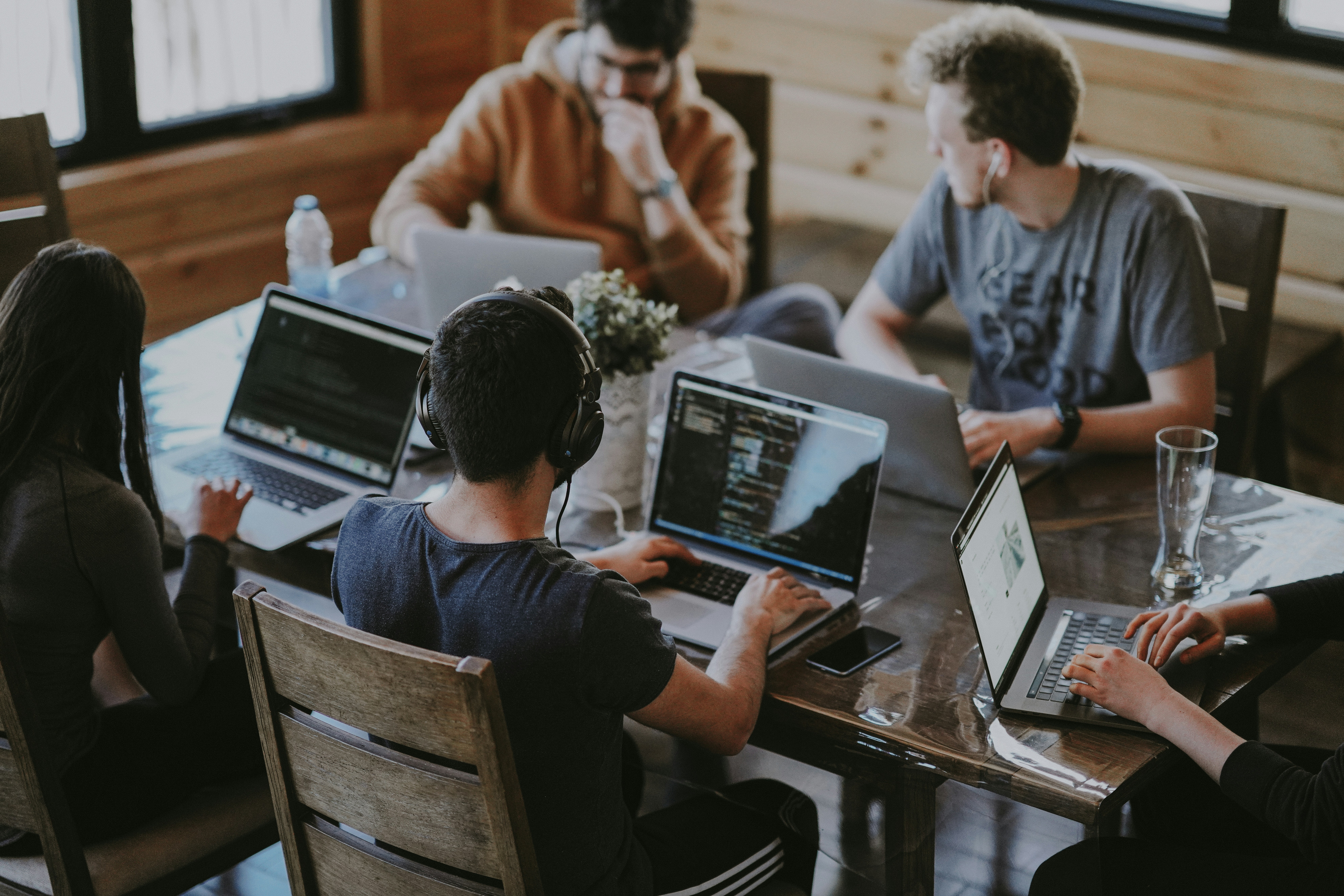 Small business team reviewing contracts and documents during a meeting